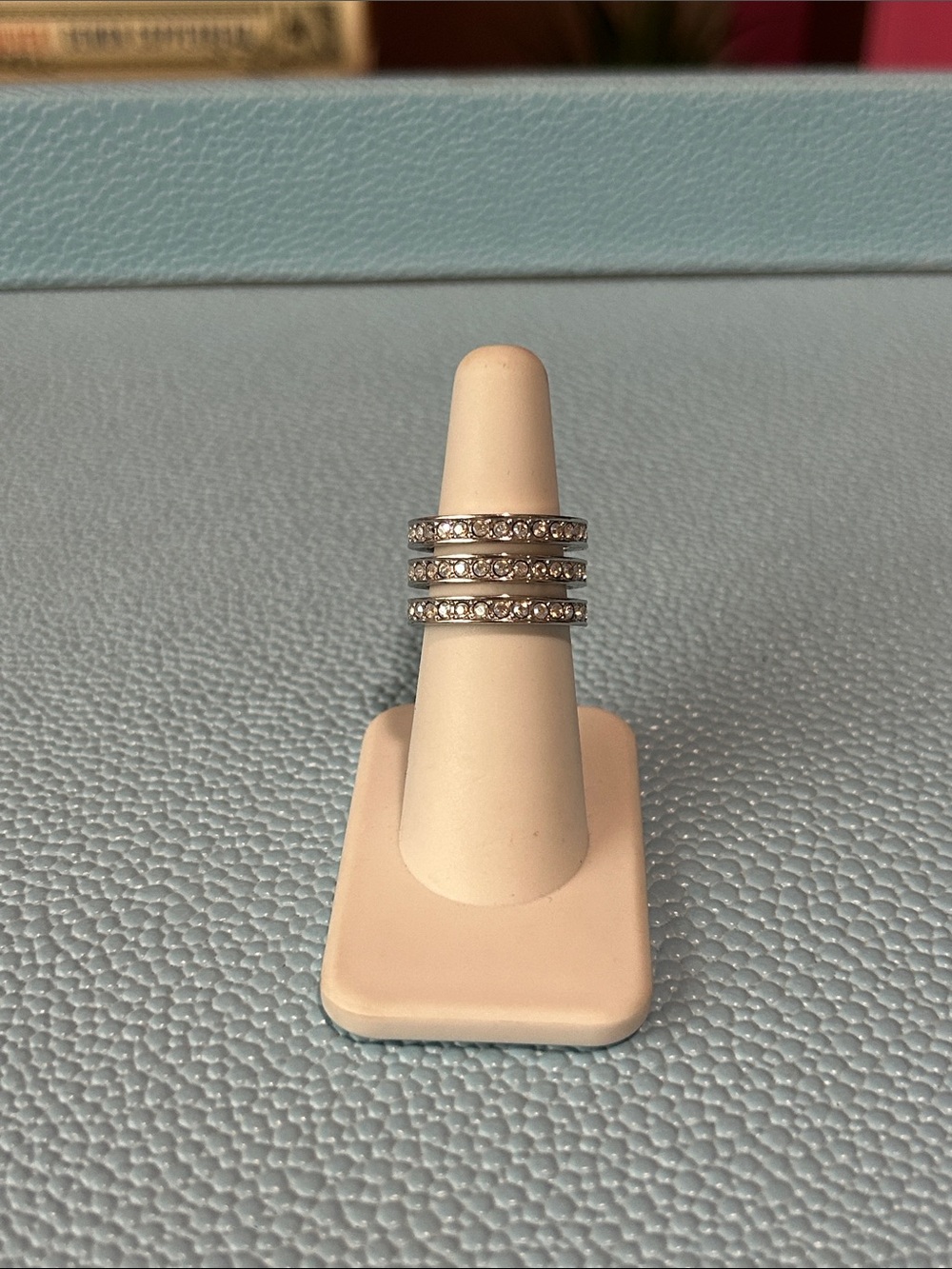 Touchstone Crystal by Swarovski triple threat ring in silver with aurora boreal